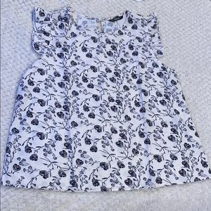 Back and white floral blouse